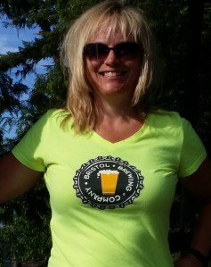 Catherine (Cat) Brubaker - taking a break from riding in Glacier National Park in Montana (August 2014)